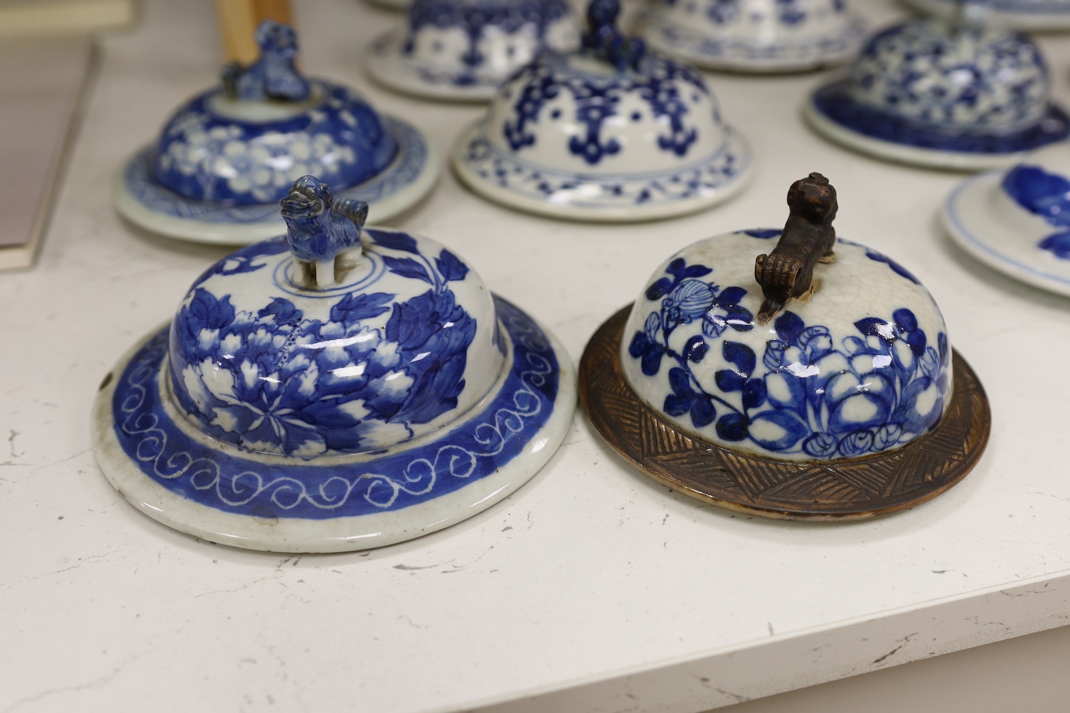 Thirty-seven 18th/19th century Chinese blue and white porcelain covers, 17cm diameter, Provenance - D.C.Monk & Son, former dealers based in Kensington Church Street, London W8